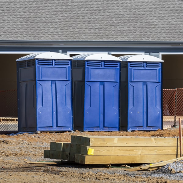 what is the cost difference between standard and deluxe portable restroom rentals in Purcellville